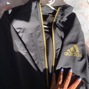 Black and gold adidas windbreaker